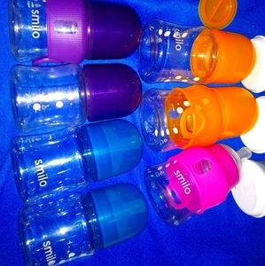 Smilo lot of brand new nipples and bottles